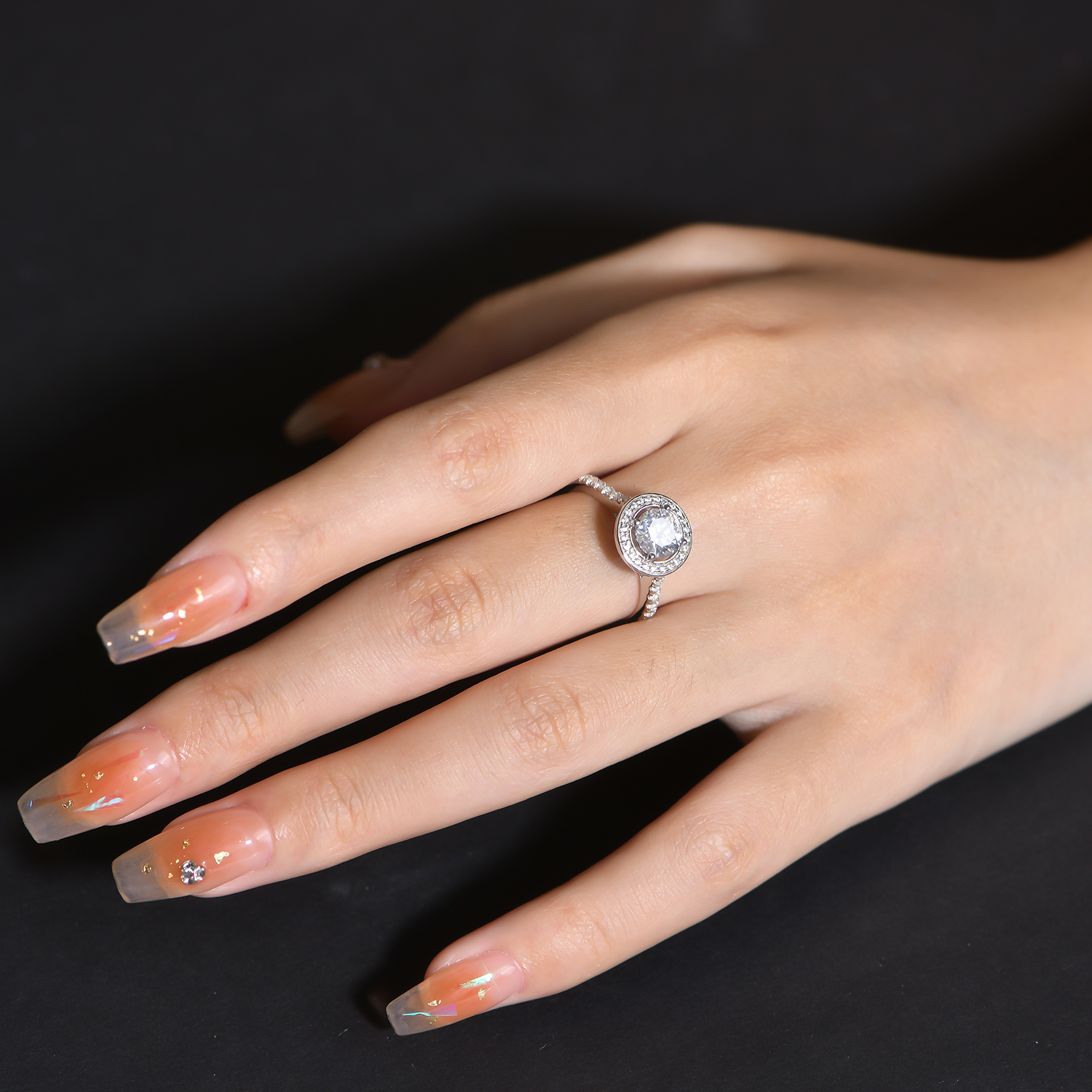 The Luminary Solitaire — 1.0ct Round Moissanite Ring in 925 Sterling Silver - Alternate Angle
